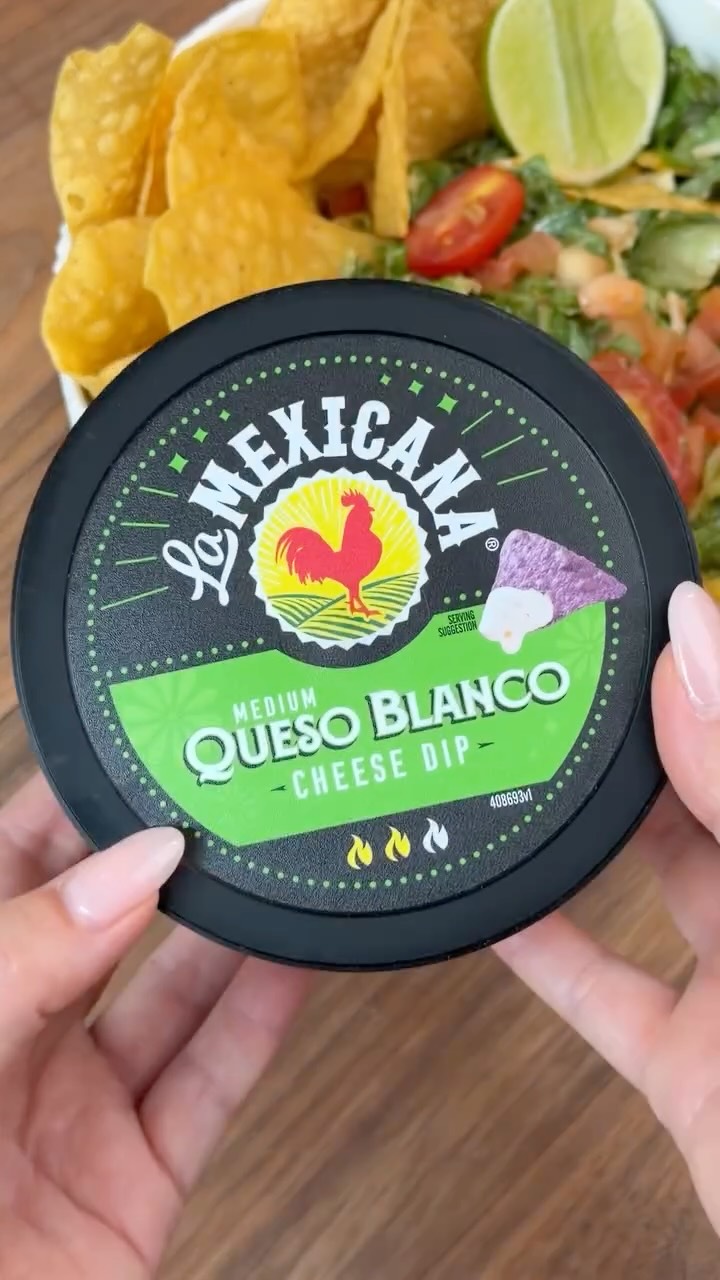 When it's hot outside, keep your toppings cool ☀️🌮 A scoop of cold La Mexicana Queso is the creamy finish your salad deserves.
